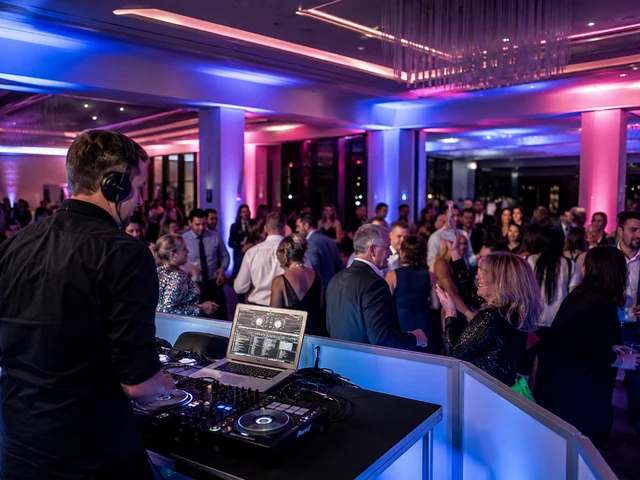 Guests dancing at a professional party DJ event